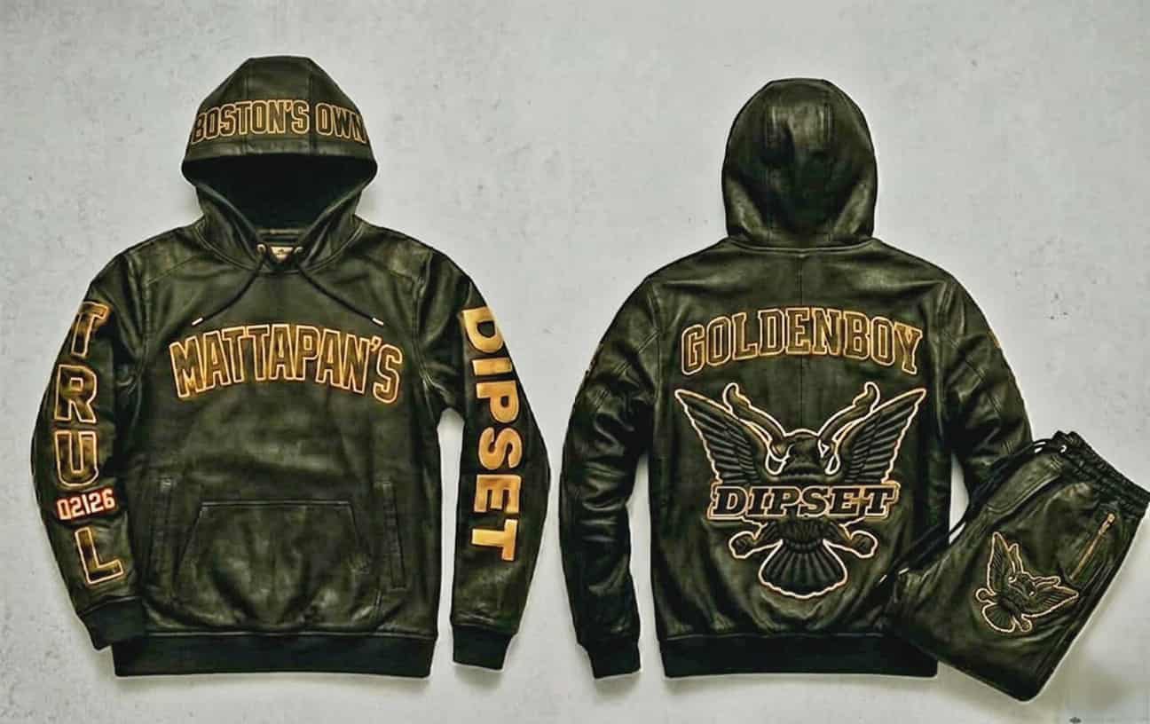 Black jacket with patches and text, hooded, displayed with matching pants, front and back views shown.