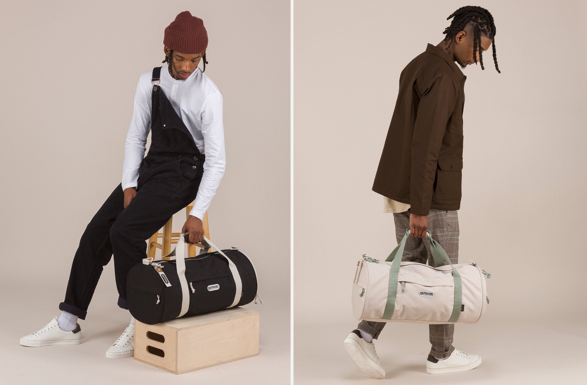 Two people with duffel bags, one standing on a box, the other walking, both against plain backgrounds.