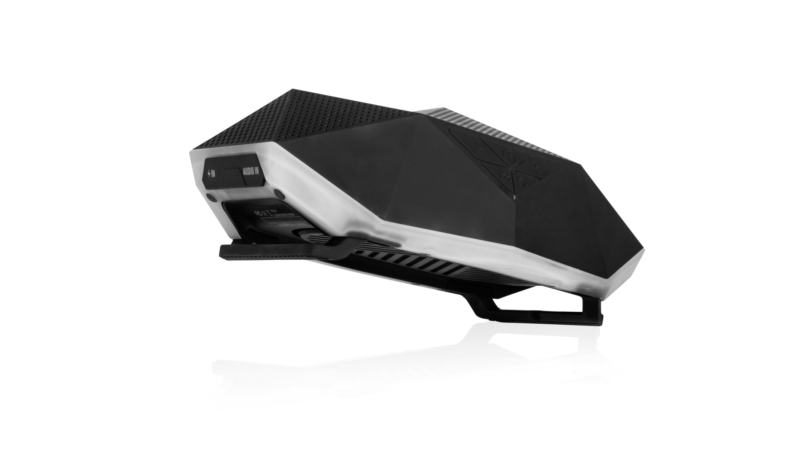 A black and white gaming mouse with a sleek, angular design and textured surface, viewed from a side angle.